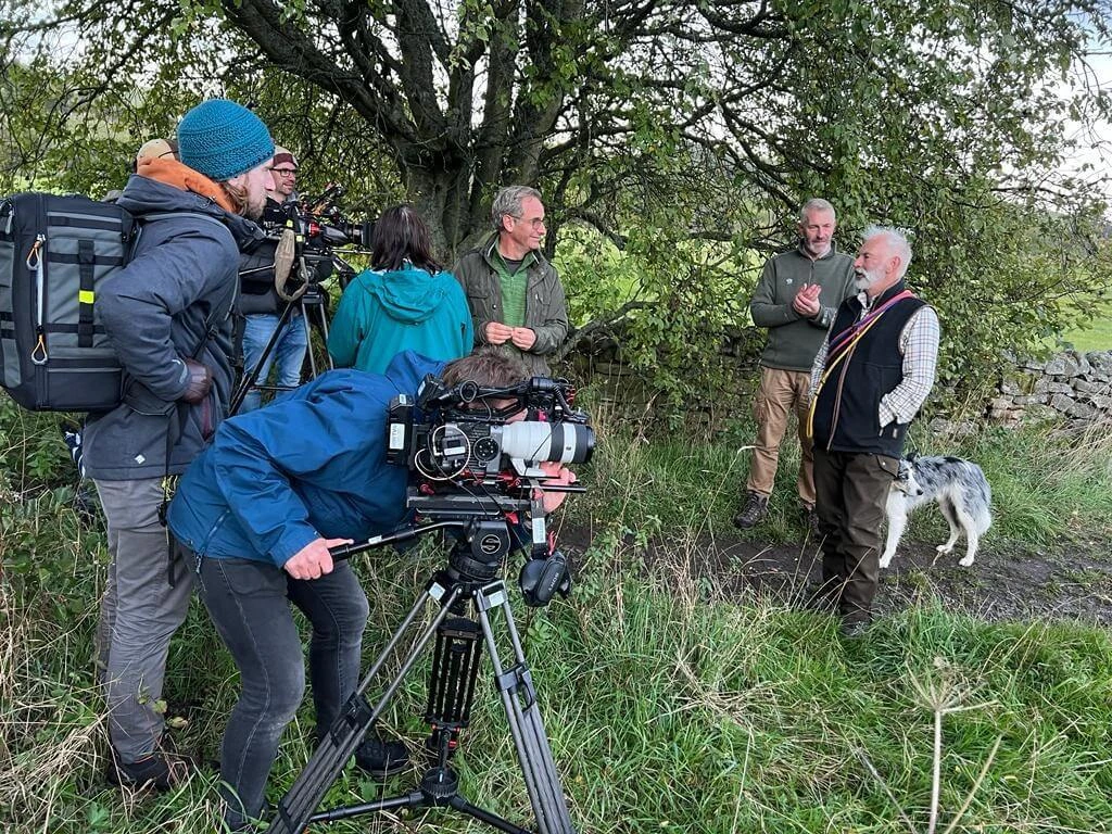 Camera filming Robson, David and Matheson